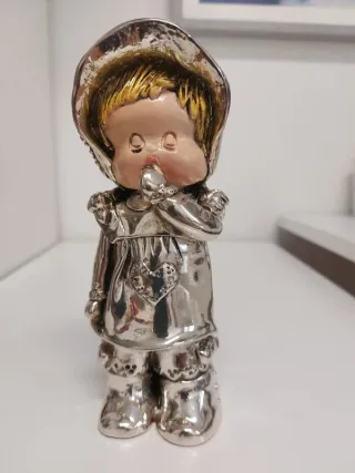 Scultura Bambola Resina Dorata