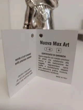 Scultura Bambola Resina Dorata