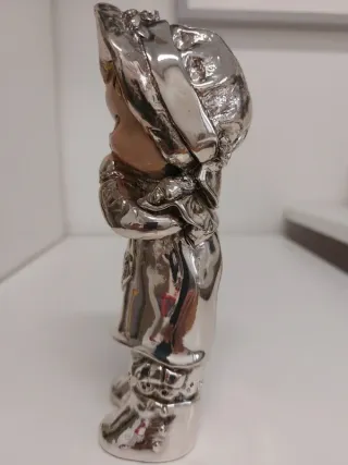 Scultura Bambola Resina Dorata