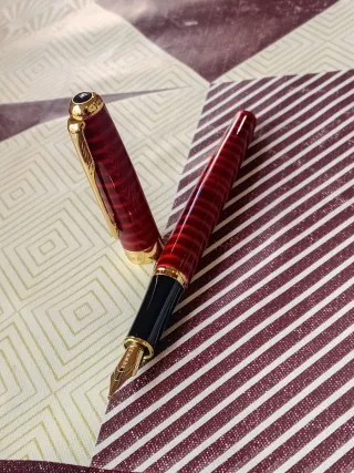 Pluma Baoer Roja