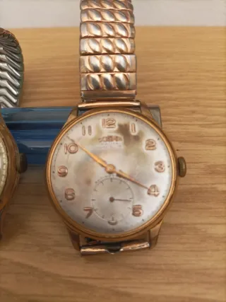 2 Relojes Dogma Oro y Plata