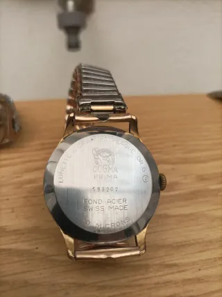 2 Relojes Dogma Oro y Plata