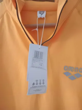 Conjunto deportivo Arena negro y naranja