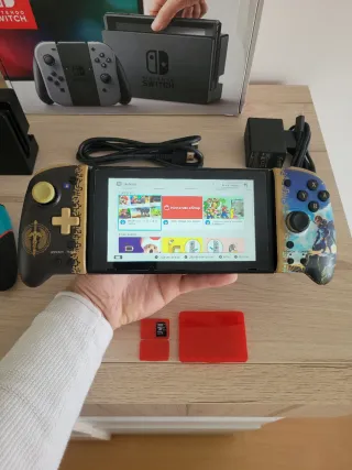 Pacchetto Nintendo Switch come nuova + Accessori