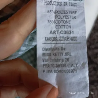 Blusa cuadros nudo cintura