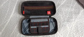 Nintendo Switch OLED + Giochi + Custodia