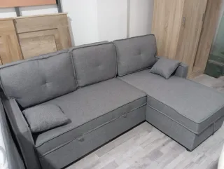 Sofá cama gris de tela