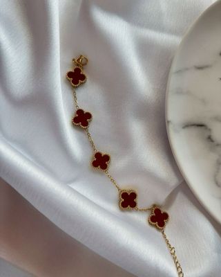 2 Braccialetti con trébols bordeaux e oro