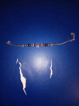 Bracciale con perline e ciondolo a forma di ancora