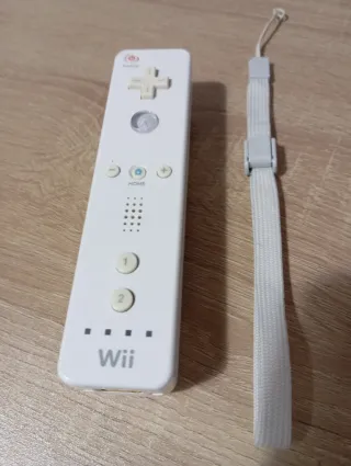Controller Wii Nintendo in buone condizioni con cinturino