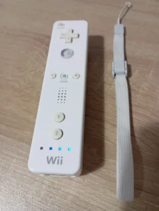 Controller Wii Nintendo in buone condizioni con cinturino