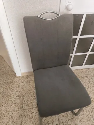 Mesa de cristal con 4 sillas