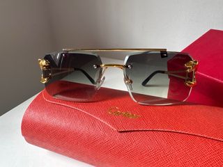 Gafas de sol Cartier doradas y grises