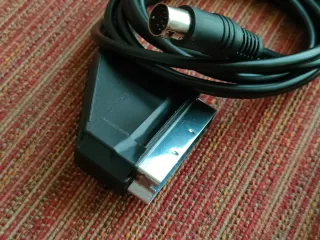 Sega Mega Drive II con giochi e cavi