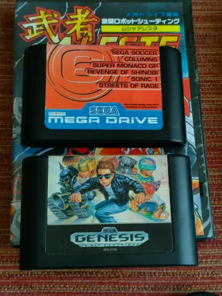Sega Mega Drive II con giochi e cavi