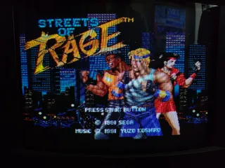 Sega Mega Drive II con giochi e cavi