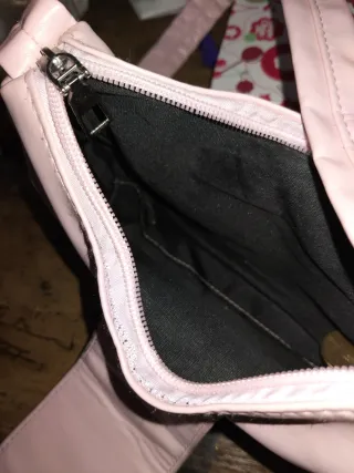 Bolso rosa con lazo plateado