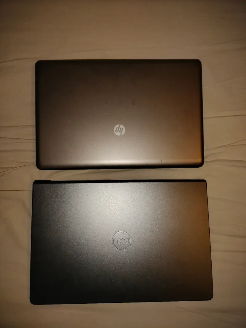 2 Portátiles HP y Dell Grises