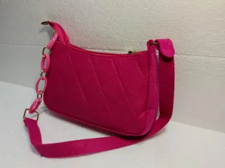 Borsetta fucsia con catena