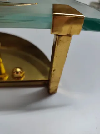 Applique in metallo dorato con decoro floreale