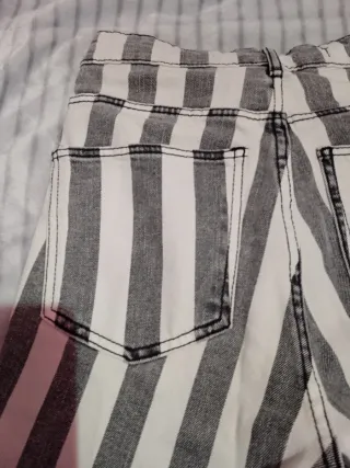 Pantalones Trafaluc rayas grises y blancas