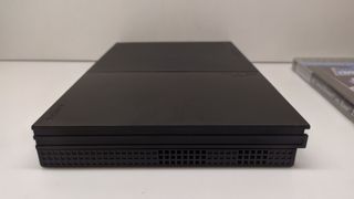 PS2 Slim SCPH 90004 + Controller + Games (LEED)