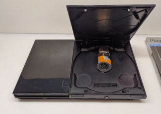 PS2 Slim SCPH 90004 + Controller + Games (LEED)