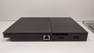 PS2 Slim SCPH 90004 + Controller + Games (LEED)