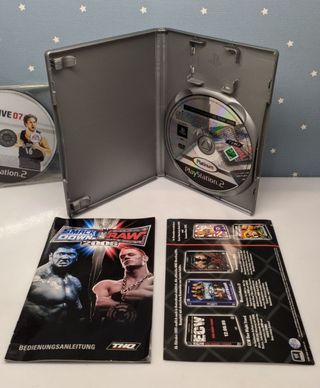 PS2 Slim SCPH 90004 + Controller + Games (LEED)