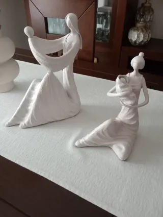 Figuras de porcelana madre e hijo