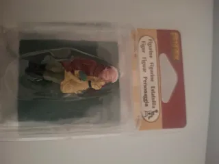 Figura Lemax sentada