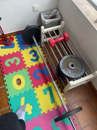 Barra 1.6m y discos pesas 5kg, 10kg