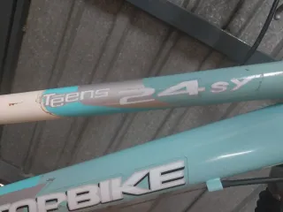 Bicicleta montaña TOPBIKE blanca y azul