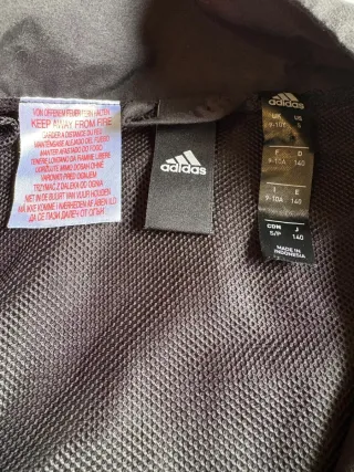 Giacca a vento Adidas Junior - Nero/Rosso (9-10 an