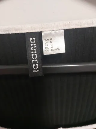 Vestido negro H&M con lazo blanco