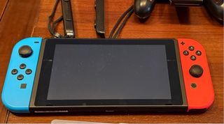 Nintendo Switch + 8 Giochi + Accessori