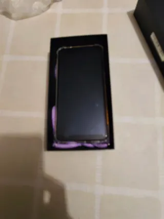 Xiaomi Redmi Note 7 con custodia e cordino