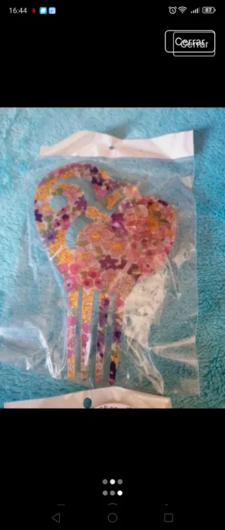 Peineta, pendientes y flores flamenca