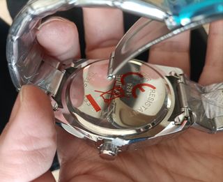 Reloj Skyline Verde y Plateado