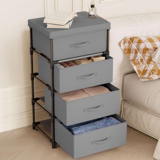 Cajonera in tessuto grigio con 4 cassetti