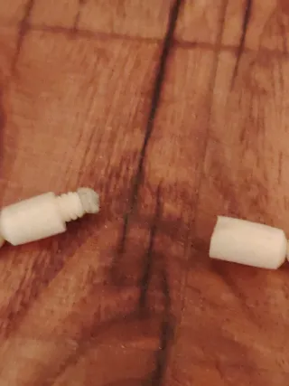 Collana perline e elementi intagliati