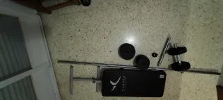 Conjunto de pesas y banco