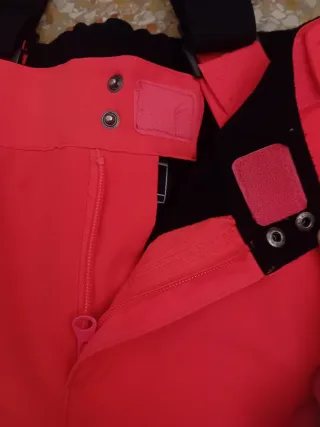 Pantaloni sci arancioni con bretelle