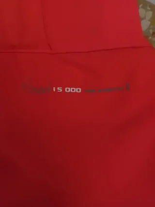 Pantaloni sci arancioni con bretelle