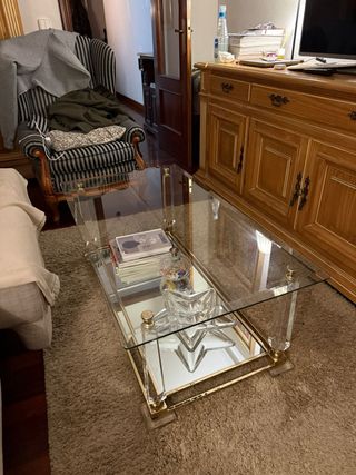Mesa de centro cristal y metal dorado