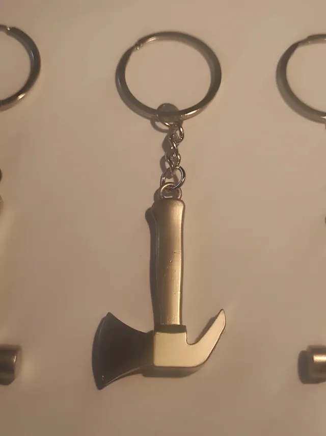 Cinco Chaveiros Metálicos com Ferramentas de Aço