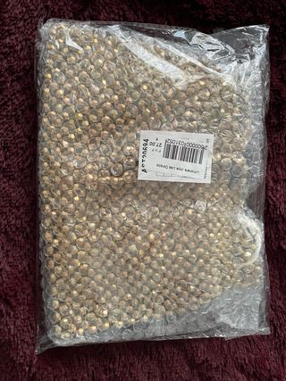 Bolso de fiesta dorado con cuentas