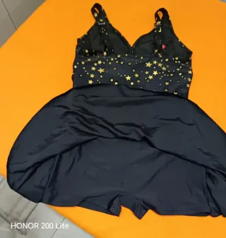 Bañador mujer estrellas negro y dorado