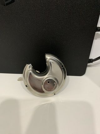 Candado de disco metálico con llaves