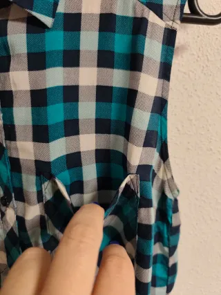 Camisa sin mangas se chica talla S de Bershka.